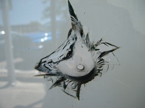 Bullet Hole in Glass